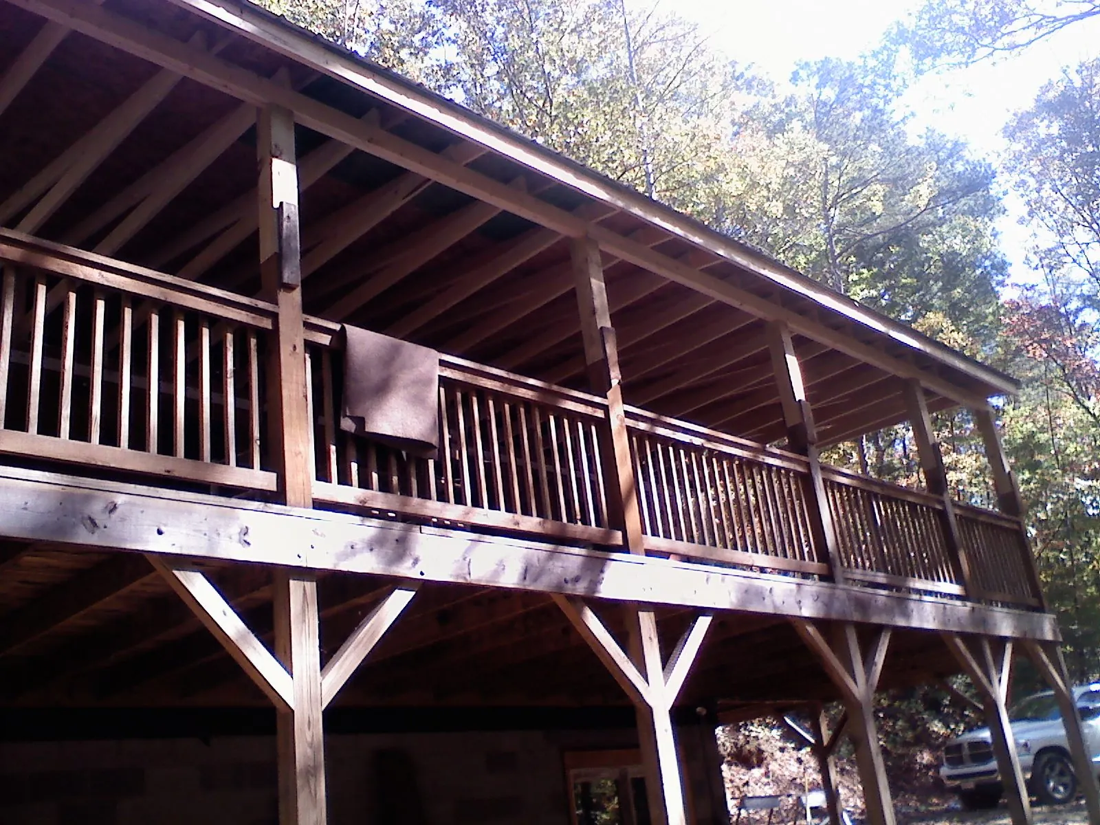 Timber framing under a new elevated porch and deck — Roof Leak Repair in Saint Cloud by Roofing Brothers